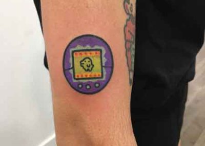 tatuaje tamagotchi | tatuajes divertidos | Clara Mc Murphy