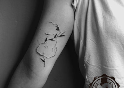 tatuaje de BonitoLoJusto: mujer con laurel