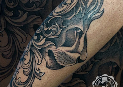 tatuajes en la pierna: tatuajes animales (león)