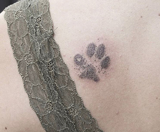 tatuajes finos | huella animal