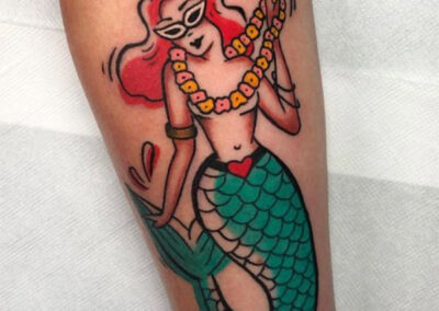 pin up tattoo de una sirena en Madrid