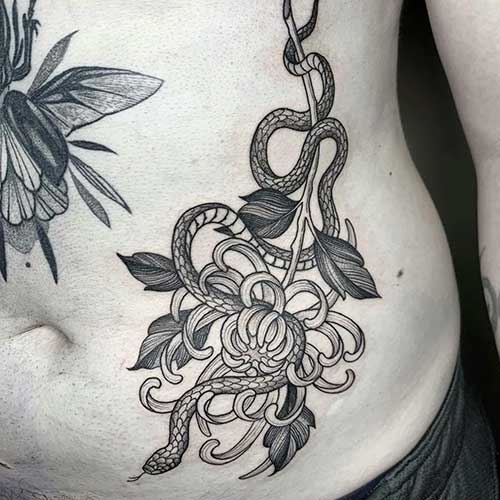Tatuaje de serpiente | Tatuaje hombre en el abdomen | Cornelius Tattoo