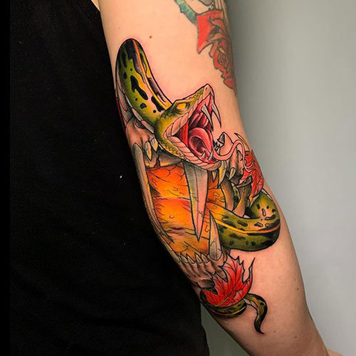 Tatuaje de una serpiente a color | Tatuaje en el brazo | Tatuajes en Madrid | Cornelius Tattoo